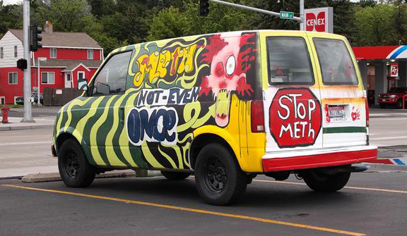 my 1985 astro van, i used latex and house paint.i wanted to use bright colors so you cant miss it. this is my daily driver i was also featured on the front page of the moscow daily news on 6-1-10 the next day i started this project it took me about a week to complete.i been driveing it every day since.you wont belive the great responce ive got .the best was when a lady told me her son was meth free for over a year. she loved my van .the (drivers side) has a man on meth with not even once,the (front has two syringes and in the middle says stop shooting meth. ( back) has a stop sign with stop meth in it, the( passenger side) has you + meth= jail bars that i made in the side window. and yes my personalized license plates (NOT ONCE) .