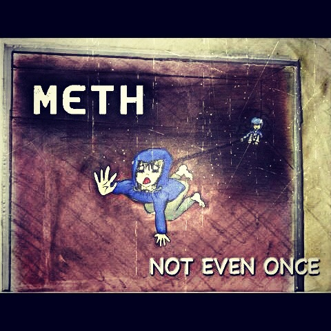 This artwork was submitted by Shana D. from Kamehameha School for the Hawaii Meth Project Take a Stand Against Meth Art contest. She credits this page http://www.methproject.org/answers/if-i-try-meth-will-i-become-an-addict.html#Inside-The-Ads-That-Guy as her inspiration.